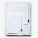 Funda para chaise longue STROZZI de lino 100 x 190 x 65 cm en color blanco