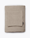 Funda para sofá STROZZI 1 plaza de lino 120 x 95 x 65 cm en color natural