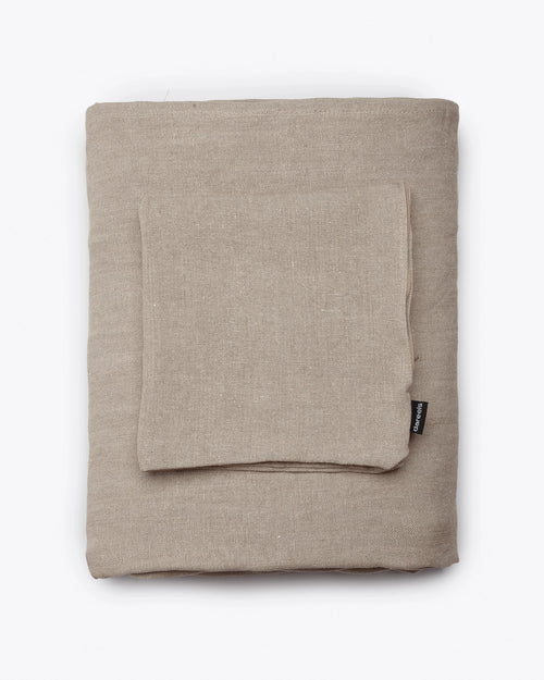 Funda para sofá STROZZI 1 plaza de lino 120 x 95 x 65 cm en color natural