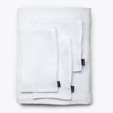 Funda para sofá STROZZI 3/4 plazas de lino 260 x 95 x 65 cm en color blanco